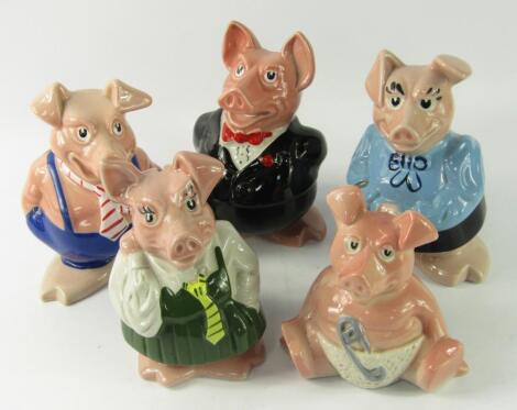 A graduated set of five Wade Nat West piggy banks.