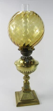 A Veritas late 19thC fluted brass oil lamp