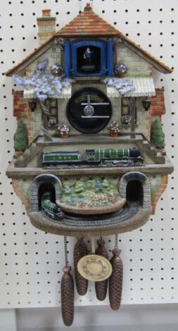 A Flying Scotsman battery operated cuckoo clock