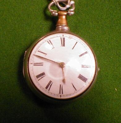 A silver pair cased open face fusee pocket watch