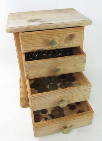 A small pedestal pine chest