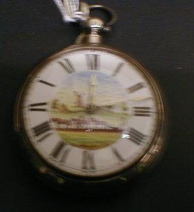 A silver pair cased open faced pocket watch