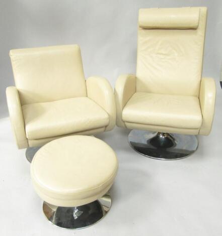 A cream leather swivel armchair