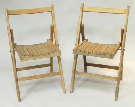 Two War Department beech folding chairs.