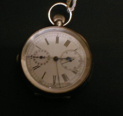 A Swiss silver cased open face bc repeater flyback chronograph