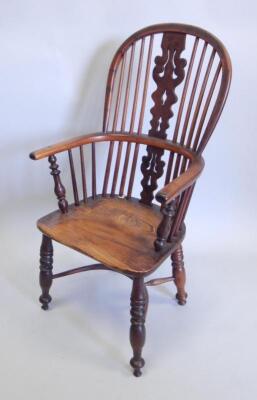 A yew ash and elm Windsor chair