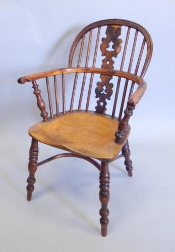 A yew ash and elm Windsor chair