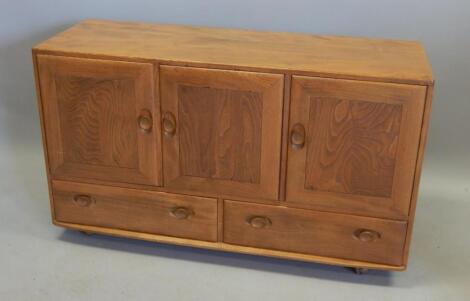 An Ercol light elm Retro style sideboard