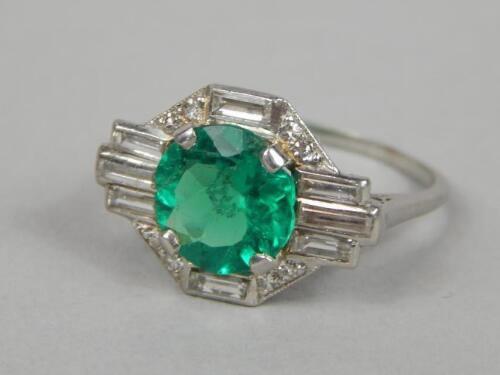 An Art Deco style emerald and diamond set ring