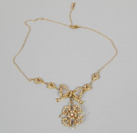 An Edwardian seed pearl set openwork necklace