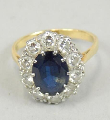 A diamond and sapphire cluster ring