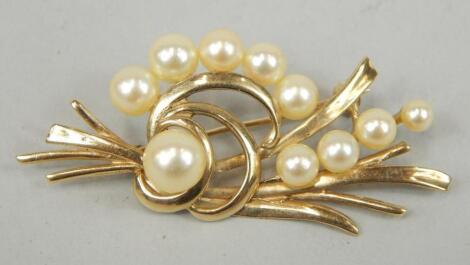 A 9ct gold and pearl bead abstract design brooch