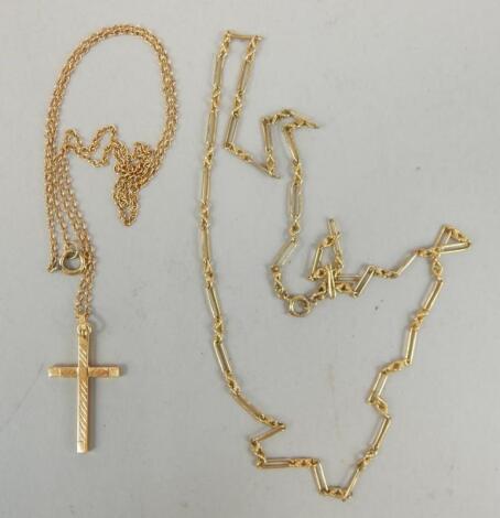 A 9ct gold crucifix and fine chain