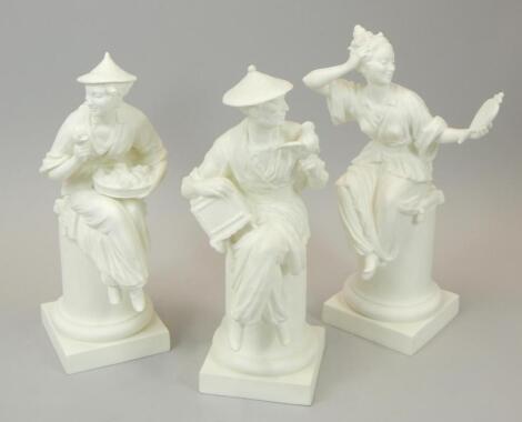 A set of three Royal Worcester porcelain figures