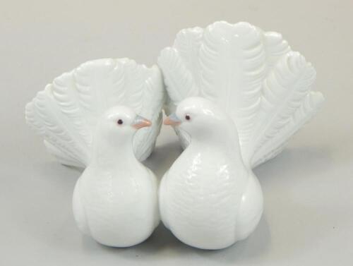 A Lladro porcelain group of two doves