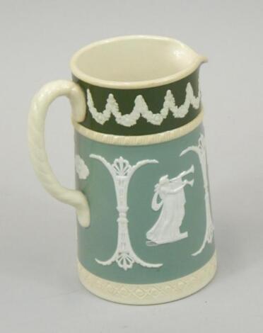 An Adams green glazed jug