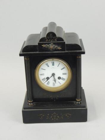 A late 19thC French black slate mantel clock