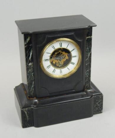 A late 19thC French black slate and marble mantel timepiece