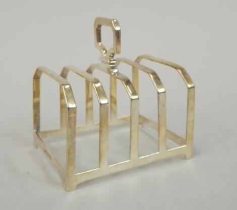 A silver four division toast rack