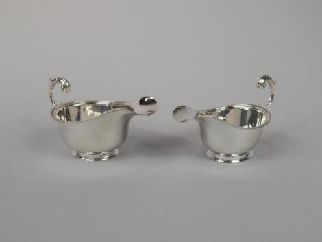 Two similar silver sauce boats