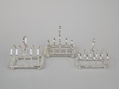 Three similar small four division toast racks