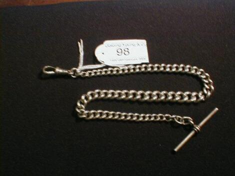 A heavy graduated curb link silver watch chain with swivel and T bar