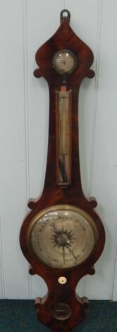 A Victorian wheel barometer by Puibus