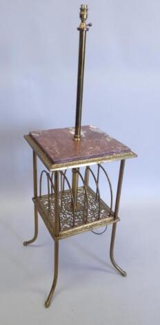 An early 20thC brass and marble floor lamp