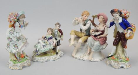 Four Continental porcelain figure groups