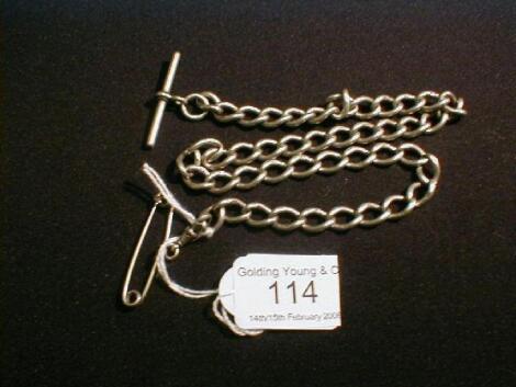 A silver large curb link watch chain