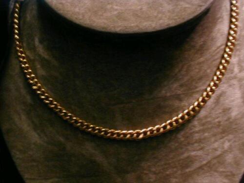 A heavy curb link chain in yellow metal stamped 916 (22ct equivalent) 21" length