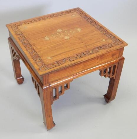 An Eastern hardwood and brass inlaid occasional table