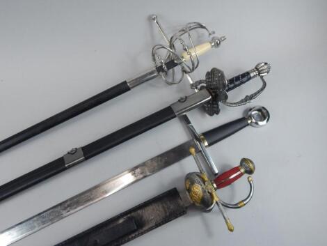 A collection of replica bladed weaponry