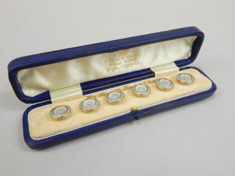 An early 20thC 9ct gold and enamel collar stud set