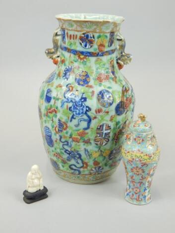 A Chinese canton style decorated vase