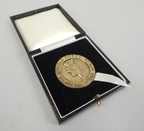 A Lincoln City silver gilt Fourth Division Championship Medal 1975-76 no. 8