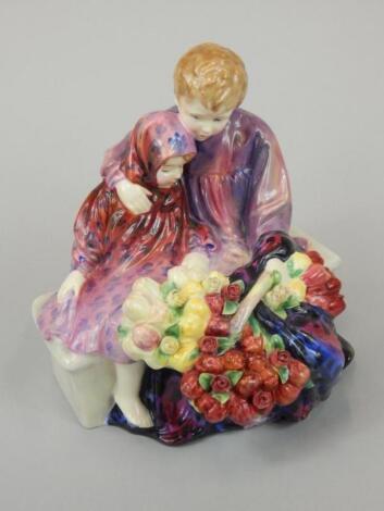 A Royal Doulton figure Flower Seller's Children HN1342