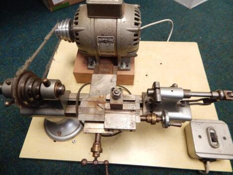 A modern Parvalux table watchmaker's lathe