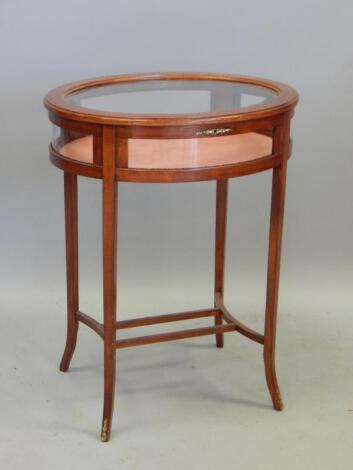 A mahogany and chequer banded display table