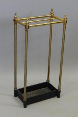 A brass six division umbrella stand