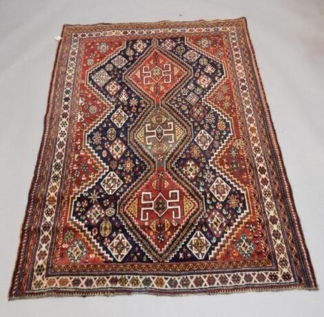 An antique Persian tribal rug