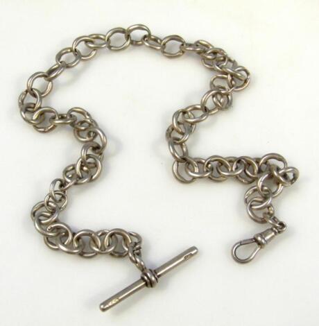 A silver watch chain with heavy links and T-bar end