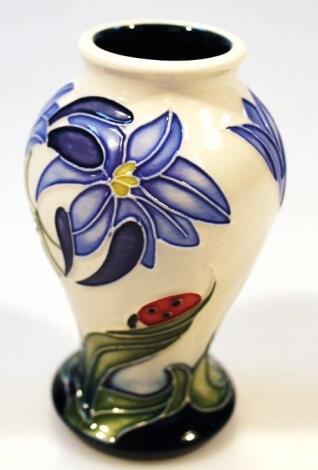 A Moorcroft Fly Away Home Series Cornflower and Ladybird pattern vase