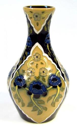 A Moorcroft Floral Bouquet vase by Penkethenan