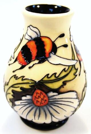 A Moorcroft pottery Flight of The Bumble Bee pattern vase by Rachel Bishop