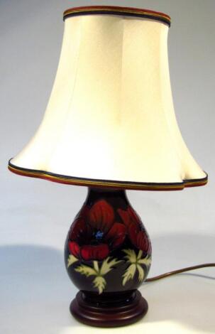 A Moorcroft Anemone pattern lamp