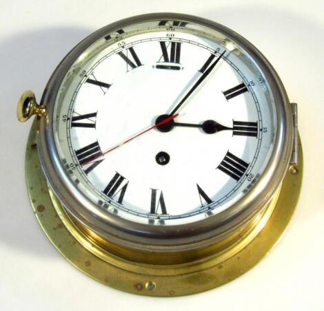 A early 20thC brass cased bulk head clock