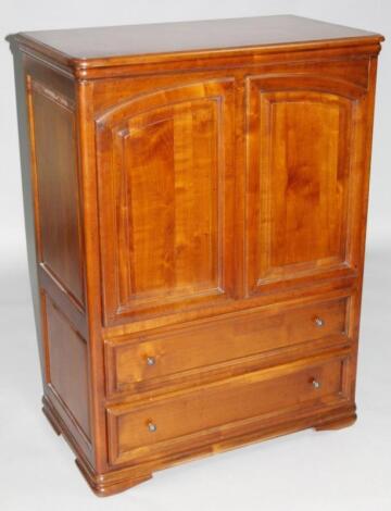 A modern yew wood walnut and mahogany finish cabinet