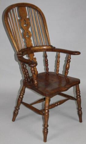 A 19thC style stained ash and elm high back Windsor chair