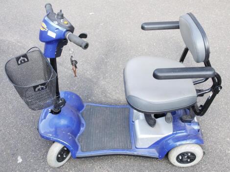 A Strider four wheeled mobility scooter